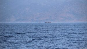 Flüchtlingsboot und Türkische Coast Guard
